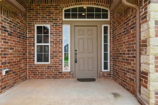 2716 Busheywood Dr, Yukon, OK 73099 - property entrance with brick siding