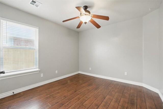 2716 Busheywood Dr, Yukon, OK 73099 - spare room featuring hardwood / wood-style floors and a ceiling fan