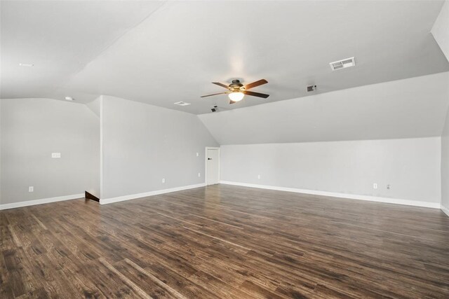 2716 Busheywood Dr, Yukon, OK 73099 - bonus room featuring vaulted ceiling, a ceiling fan, and dark wood finished floors