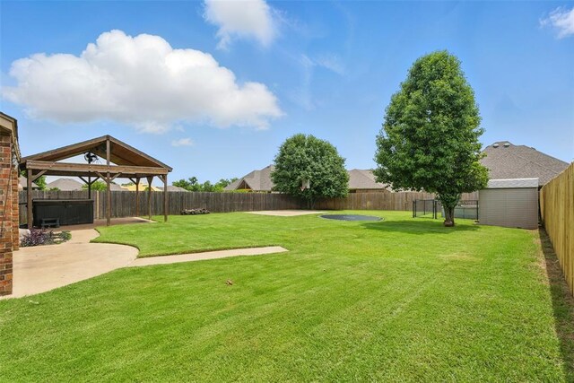 2716 Busheywood Dr, Yukon, OK 73099 - fenced backyard featuring a patio and a gazebo