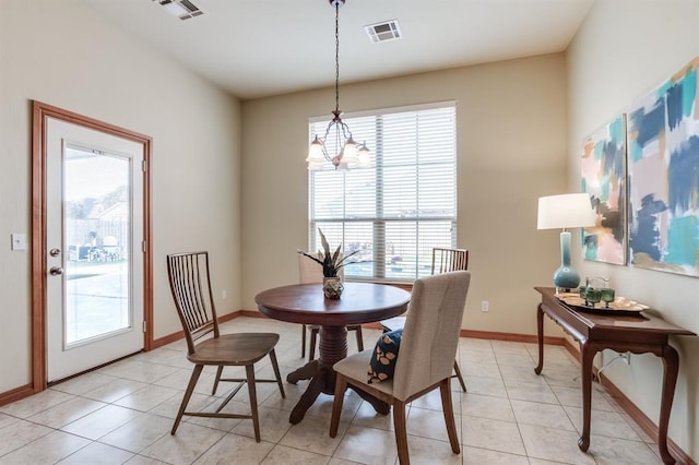 2809 SW 136th St, Oklahoma City, OK 73170 - dining area with plenty of natural light, a chandelier, and light tile patterned flooring