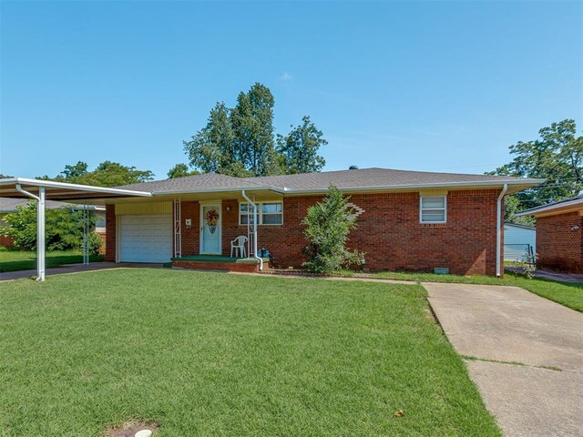 3113 SE 20th St, Oklahoma City, OK 73115 - ranch-style home with a garage, a front yard, brick siding, driveway, and roof with shingles