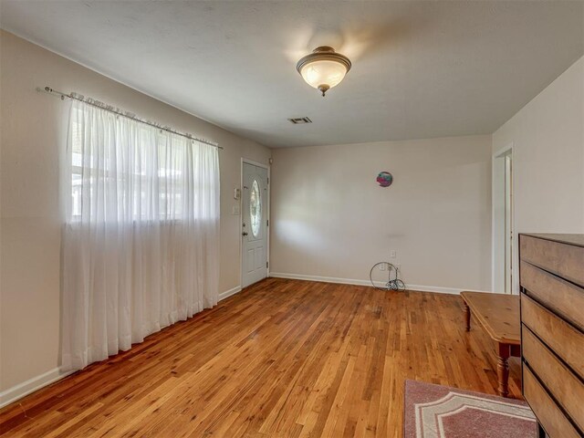 3113 SE 20th St, Oklahoma City, OK 73115 - entryway with light wood-style flooring and baseboards