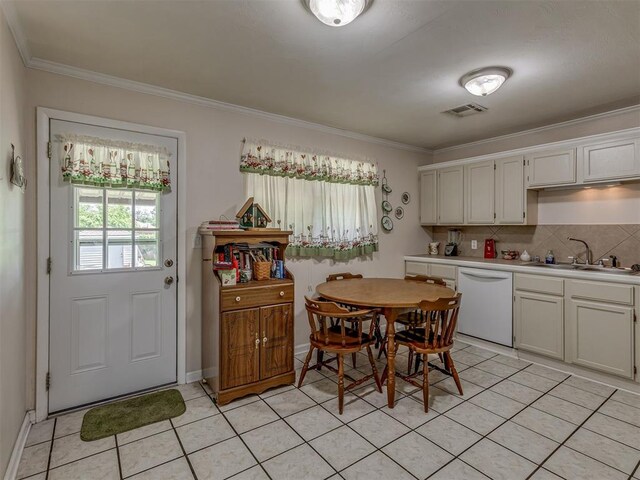 3113 SE 20th St, Oklahoma City, OK 73115 - dining space featuring light tile patterned floors and crown molding