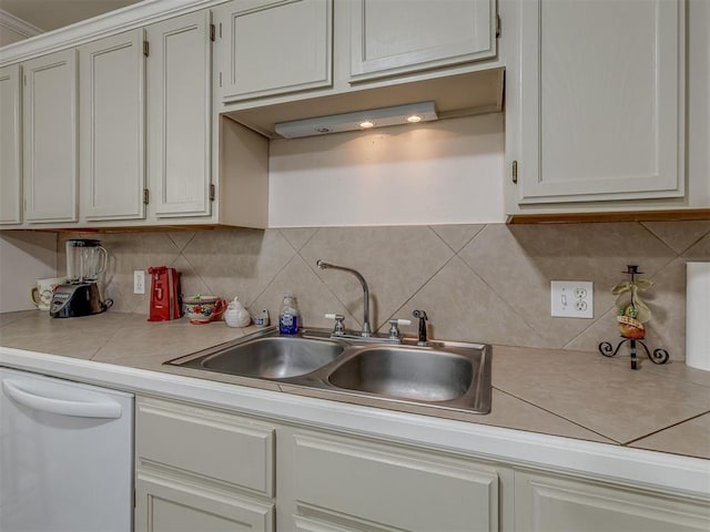 3113 SE 20th St, Oklahoma City, OK 73115 - kitchen featuring dishwasher, light countertops, and tasteful backsplash