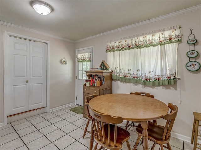 3113 SE 20th St, Oklahoma City, OK 73115 - dining area with crown molding and light tile patterned floors