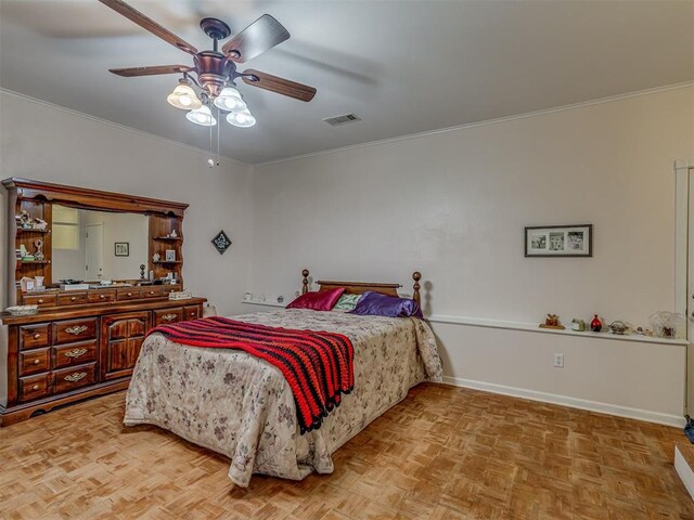 3113 SE 20th St, Oklahoma City, OK 73115 - bedroom with ornamental molding and a ceiling fan