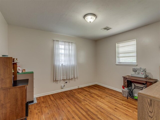3113 SE 20th St, Oklahoma City, OK 73115 - unfurnished office featuring light wood-style floors and baseboards