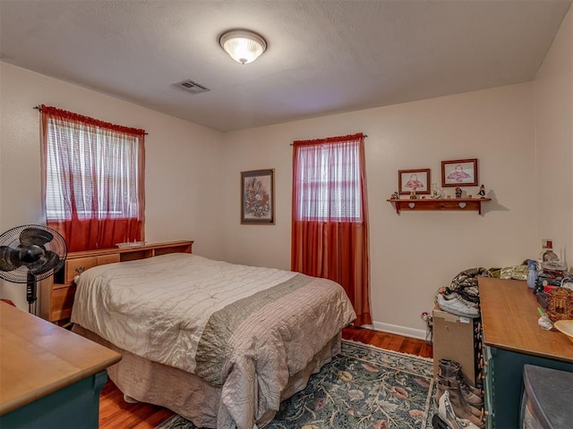 3113 SE 20th St, Oklahoma City, OK 73115 - bedroom with wood finished floors and baseboards