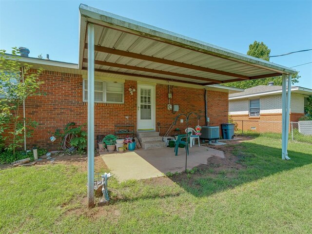 3113 SE 20th St, Oklahoma City, OK 73115 - rear view of property featuring entry steps and brick siding