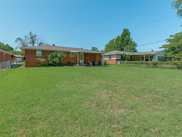 3113 SE 20th St, Oklahoma City, OK 73115 - back of property with brick siding