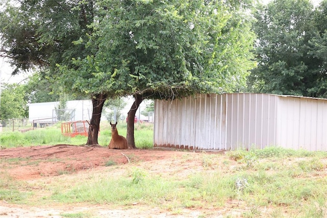12693 258th St, Blanchard, OK 73010 - view of yard featuring an outbuilding