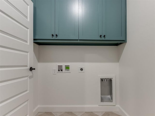 9320 NW 84th St, Yukon, OK 73099 - laundry area with electric dryer hookup, cabinet space, and hookup for a washing machine