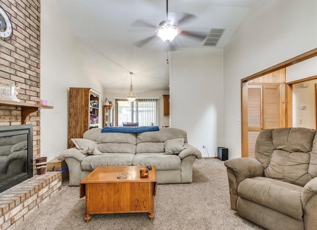 302 W Branches Way, Mustang, OK 73064 - living room with carpet floors, ceiling fan, high vaulted ceiling, and a fireplace