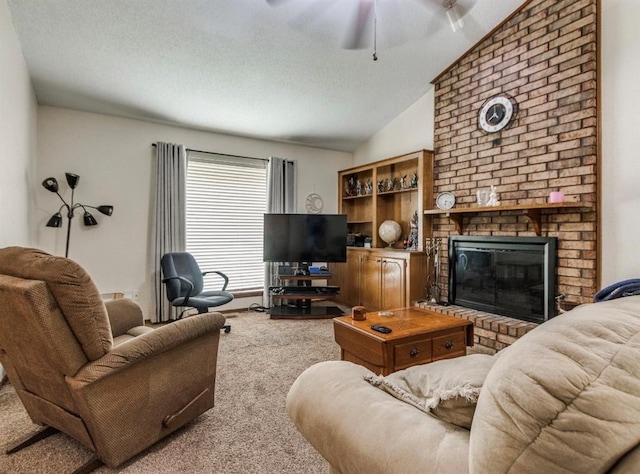 302 W Branches Way, Mustang, OK 73064 - carpeted living room with ceiling fan, lofted ceiling, a brick fireplace, and a textured ceiling