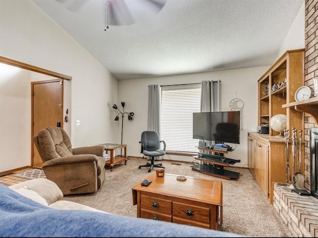 302 W Branches Way, Mustang, OK 73064 - living room with carpet floors, a ceiling fan, lofted ceiling, and a textured ceiling