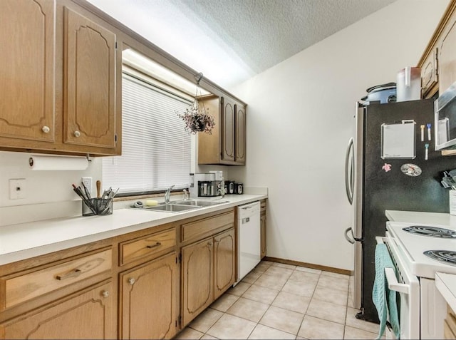 302 W Branches Way, Mustang, OK 73064 - kitchen featuring white appliances, light tile patterned floors, light countertops, and a textured ceiling