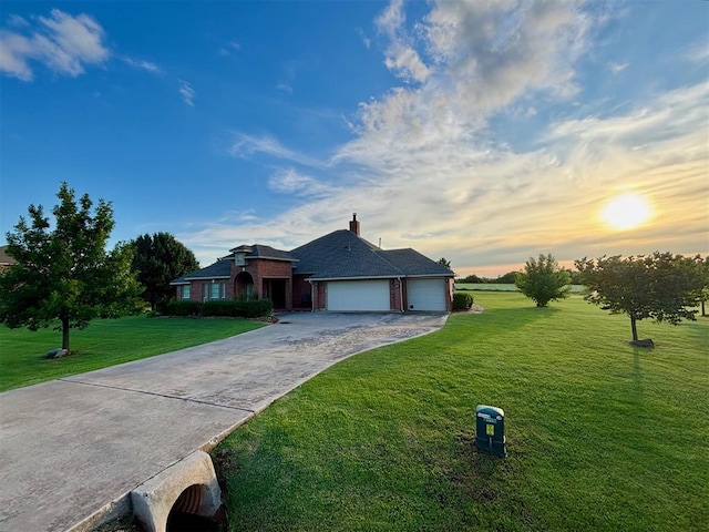 20301 Flowered Meadows Way, Edmond, OK 73012 - single story home featuring a front lawn, an attached garage, driveway, and brick siding
