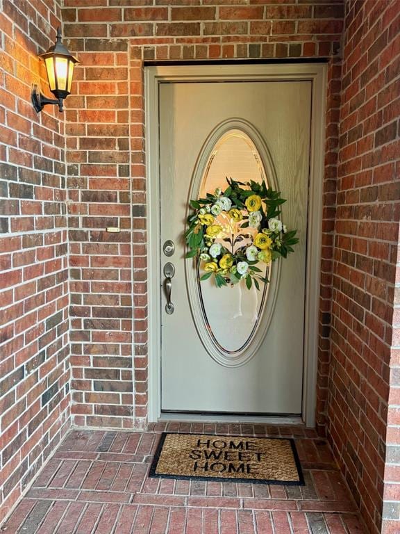 20301 Flowered Meadows Way, Edmond, OK 73012 - property entrance featuring brick siding