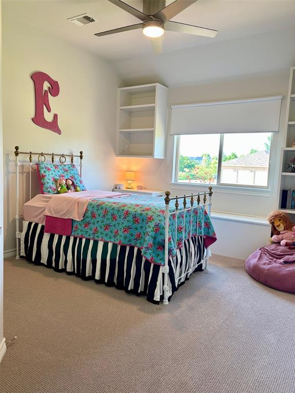 20301 Flowered Meadows Way, Edmond, OK 73012 - bedroom with carpet and ceiling fan