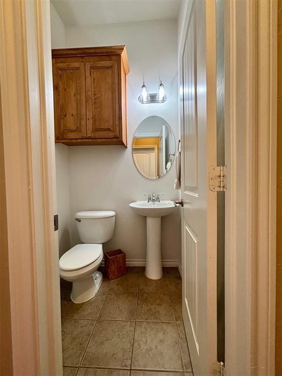 20301 Flowered Meadows Way, Edmond, OK 73012 - bathroom with toilet and tile patterned flooring