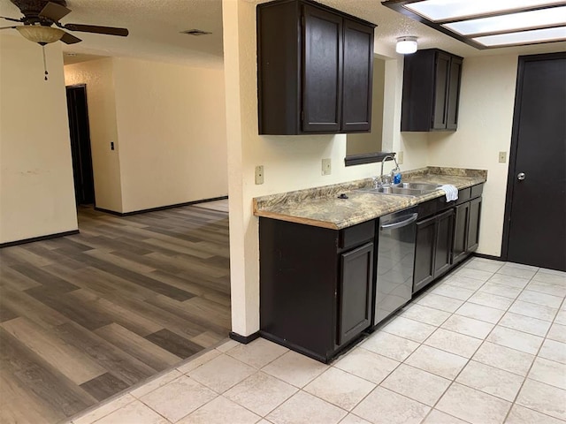 516 Ridgecrest Rd, Edmond, OK 73013 - kitchen featuring dishwasher, a textured ceiling, a ceiling fan, light countertops, and light tile patterned floors