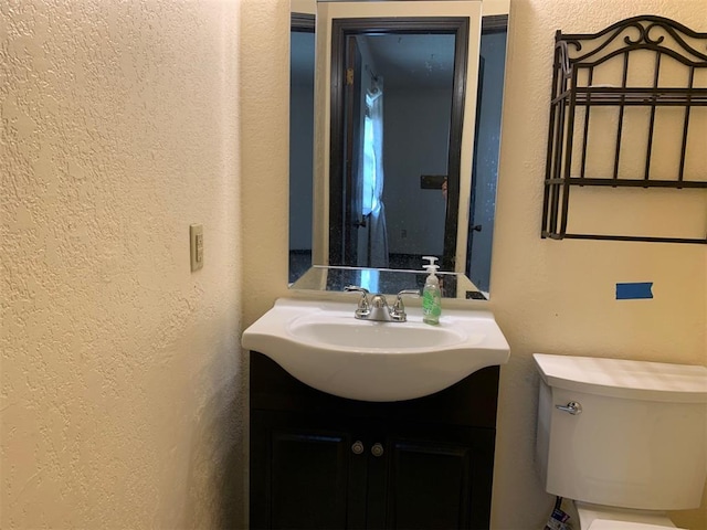 516 Ridgecrest Rd, Edmond, OK 73013 - half bath with a textured wall and vanity