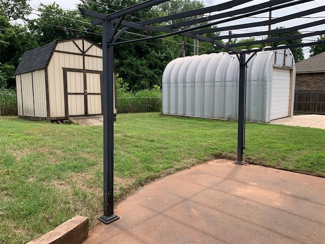 516 Ridgecrest Rd, Edmond, OK 73013 - view of yard with a storage shed, a pergola, a patio, and a detached garage
