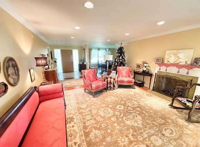 1516 N Hudson St, Altus, OK 73521 - living room featuring ornamental molding, recessed lighting, and wood finished floors