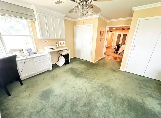 1516 N Hudson St, Altus, OK 73521 - office area featuring a ceiling fan, crown molding, light colored carpet, and built in desk