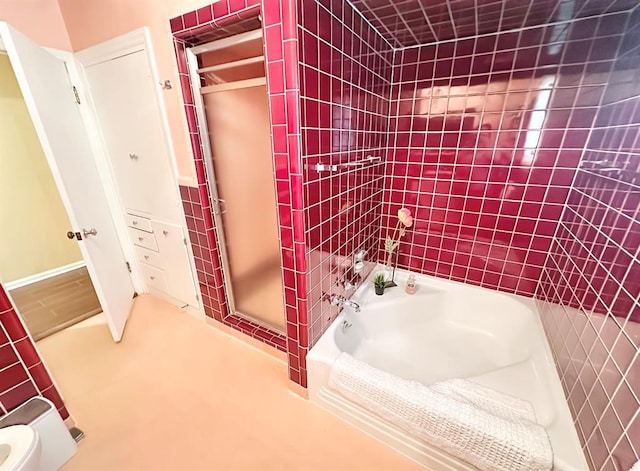 1516 N Hudson St, Altus, OK 73521 - bathroom featuring a stall shower and a tub to relax in