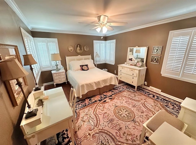 1516 N Hudson St, Altus, OK 73521 - bedroom featuring ornamental molding, a ceiling fan, and wood finished floors