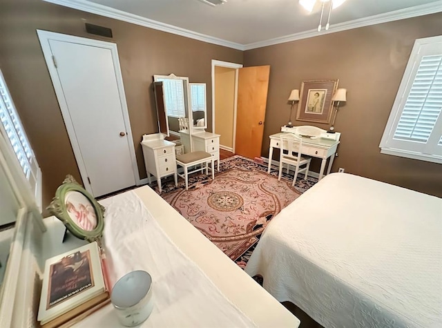 1516 N Hudson St, Altus, OK 73521 - bedroom featuring crown molding