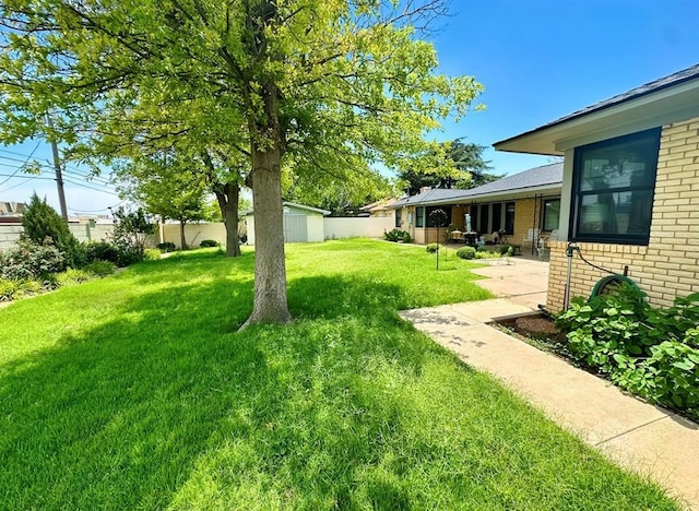 1516 N Hudson St, Altus, OK 73521 - view of yard with a patio area and an outbuilding