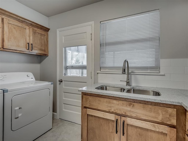 2104 Westchester Dr, Oklahoma City, OK 73120 - washroom with washer / clothes dryer, cabinet space, and light tile patterned floors