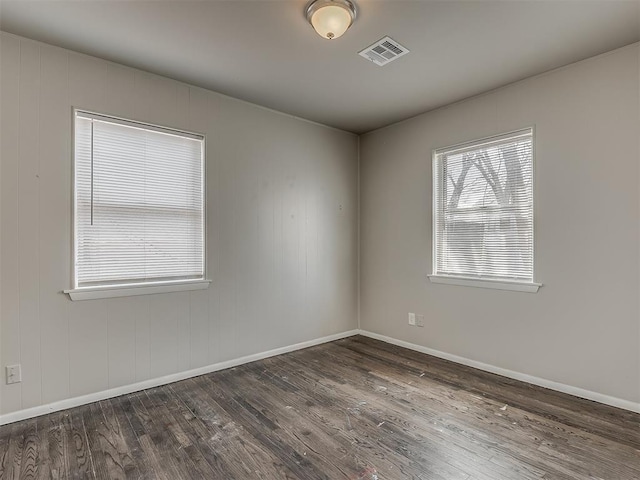 2104 Westchester Dr, Oklahoma City, OK 73120 - unfurnished room featuring dark wood-style floors and baseboards