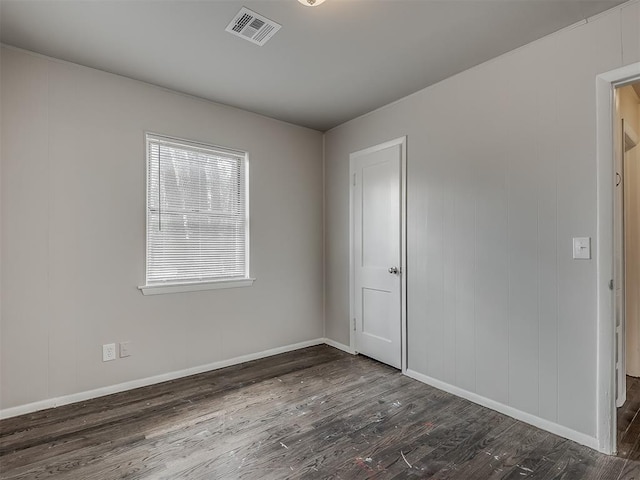 2104 Westchester Dr, Oklahoma City, OK 73120 - empty room with dark wood finished floors