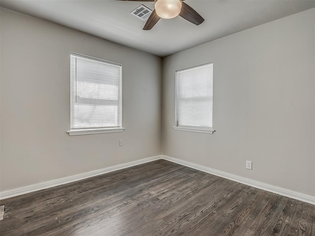 2104 Westchester Dr, Oklahoma City, OK 73120 - spare room with dark wood-type flooring and a ceiling fan