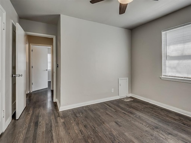 2104 Westchester Dr, Oklahoma City, OK 73120 - empty room with a ceiling fan and dark wood-type flooring