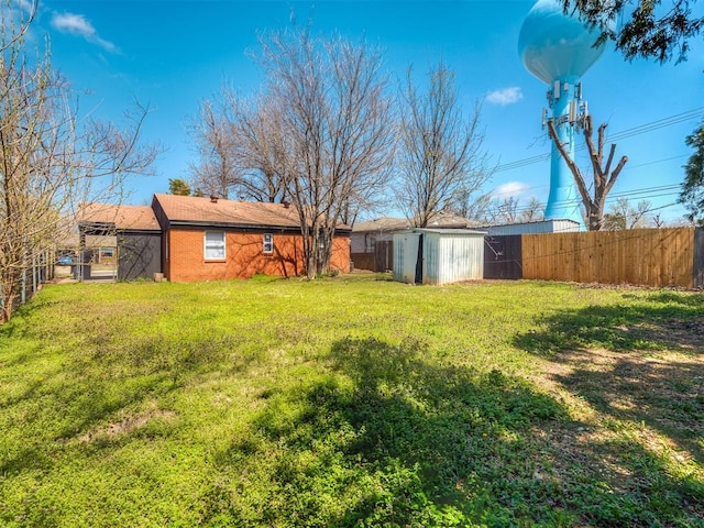2104 Westchester Dr, Oklahoma City, OK 73120 - fenced backyard with a storage shed