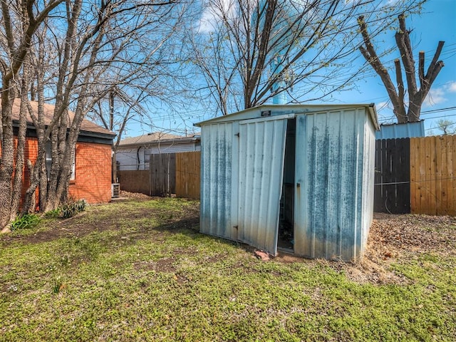 2104 Westchester Dr, Oklahoma City, OK 73120 - view of shed featuring a fenced backyard