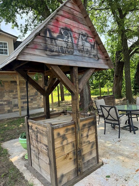 36166 Ew 1120th Rd, Seminole, OK 74868 - view of patio / terrace featuring outdoor dining area