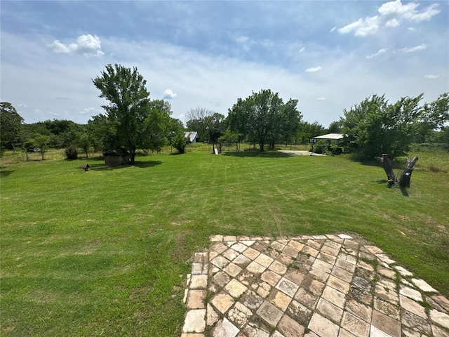 36166 Ew 1120th Rd, Seminole, OK 74868 - view of grassy yard featuring a patio area