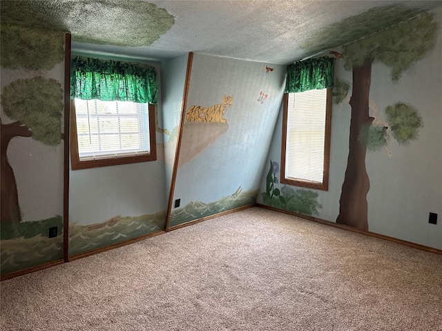 36166 Ew 1120th Rd, Seminole, OK 74868 - empty room with carpet floors and a textured ceiling