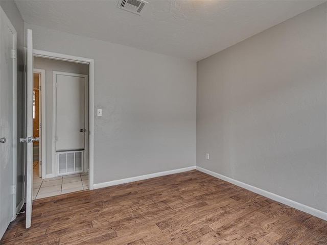 2805 SW 60th St, Oklahoma City, OK 73159 - unfurnished room with wood finished floors