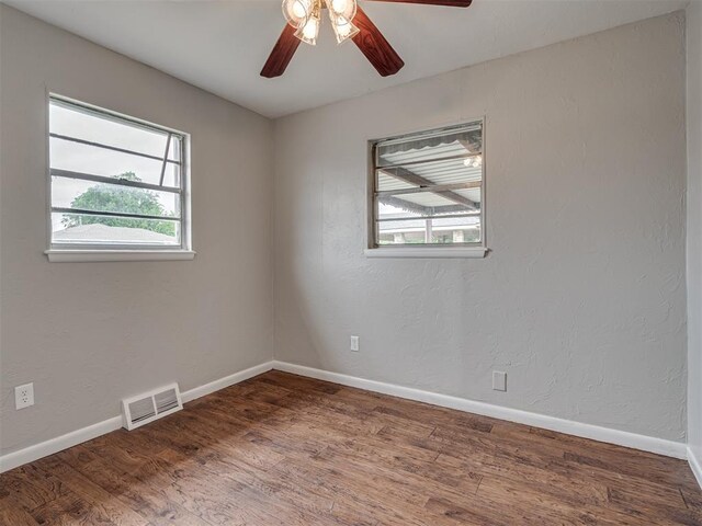 2805 SW 60th St, Oklahoma City, OK 73159 - unfurnished room featuring wood finished floors and ceiling fan