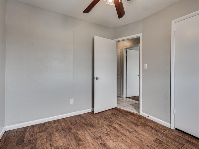 2805 SW 60th St, Oklahoma City, OK 73159 - empty room featuring a ceiling fan and wood finished floors