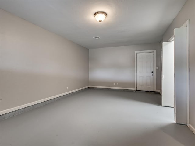 2805 SW 60th St, Oklahoma City, OK 73159 - spare room featuring finished concrete flooring and baseboards