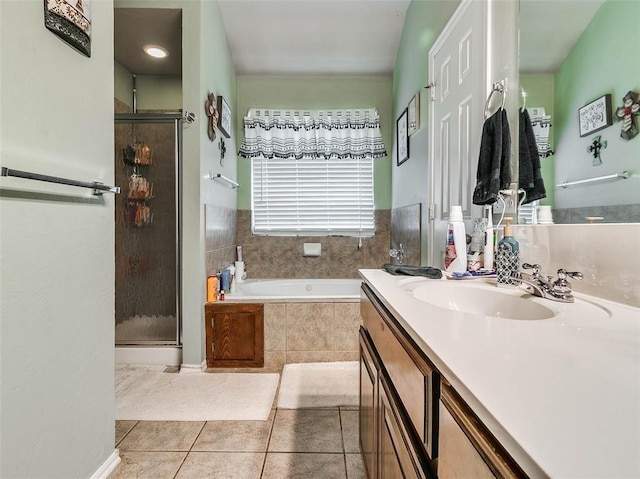 1201 W Churchill Way, Mustang, OK 73064 - bathroom featuring vanity, a bath, a shower stall, and tile patterned flooring