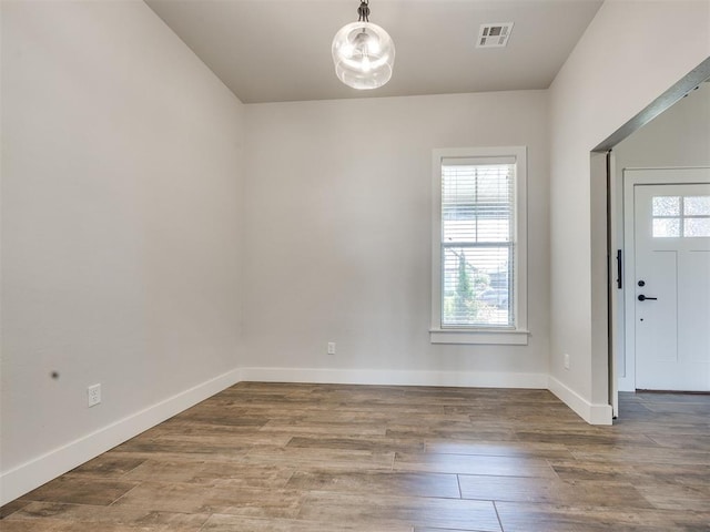 16405 Brookefield Dr, Edmond, OK 73013 - entryway featuring wood finished floors and a chandelier